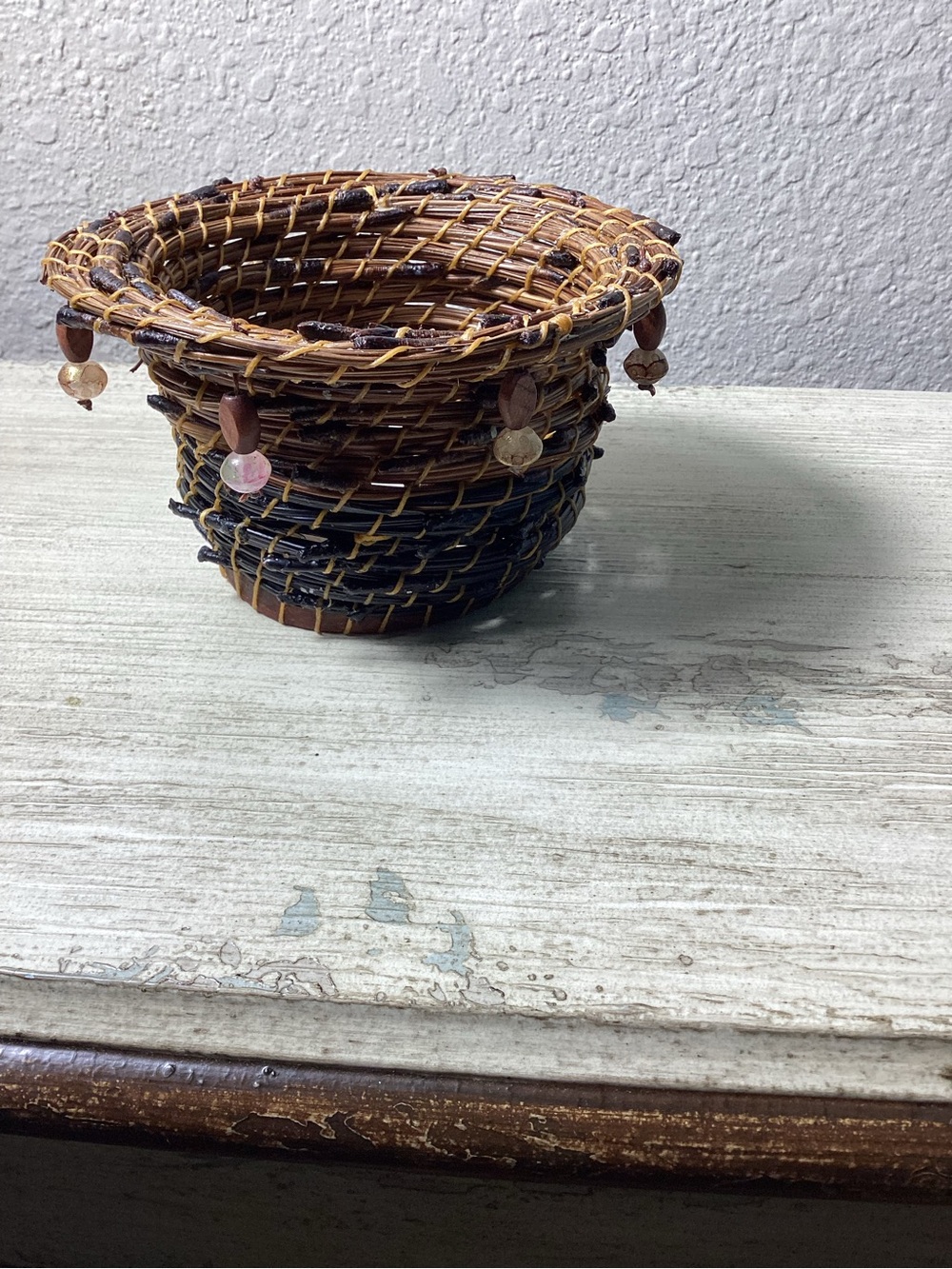 Handwoven Decorative Basket with Brown and Black Tones